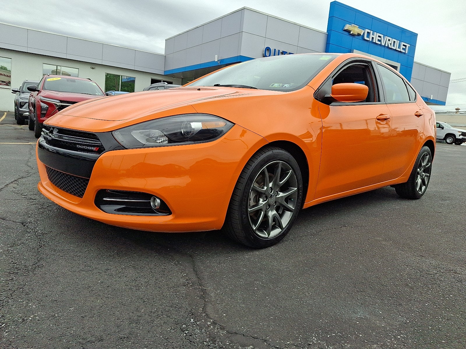 2013 Dodge Dart SXT FWD in Header Orange — front three-quarter view
