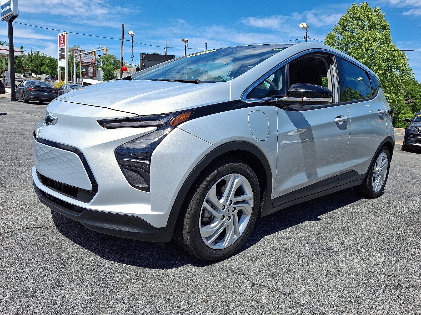 2023 Chevrolet Bolt EV 1LT FWD in Silver Flare Metallic — front three-quarter view