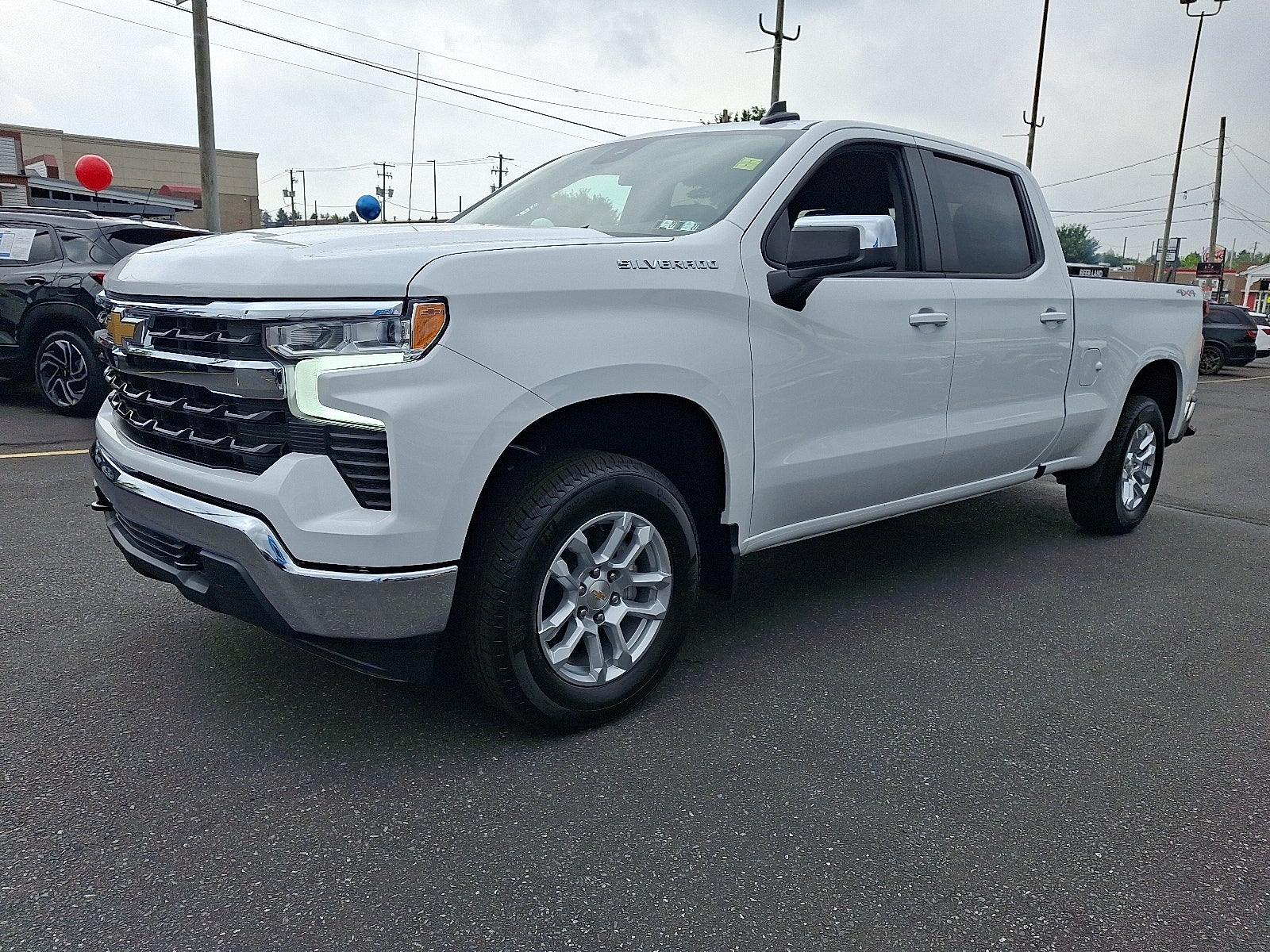 2026 Chevrolet Silverado 1500 LT 4WD in Summit White — front three-quarter view