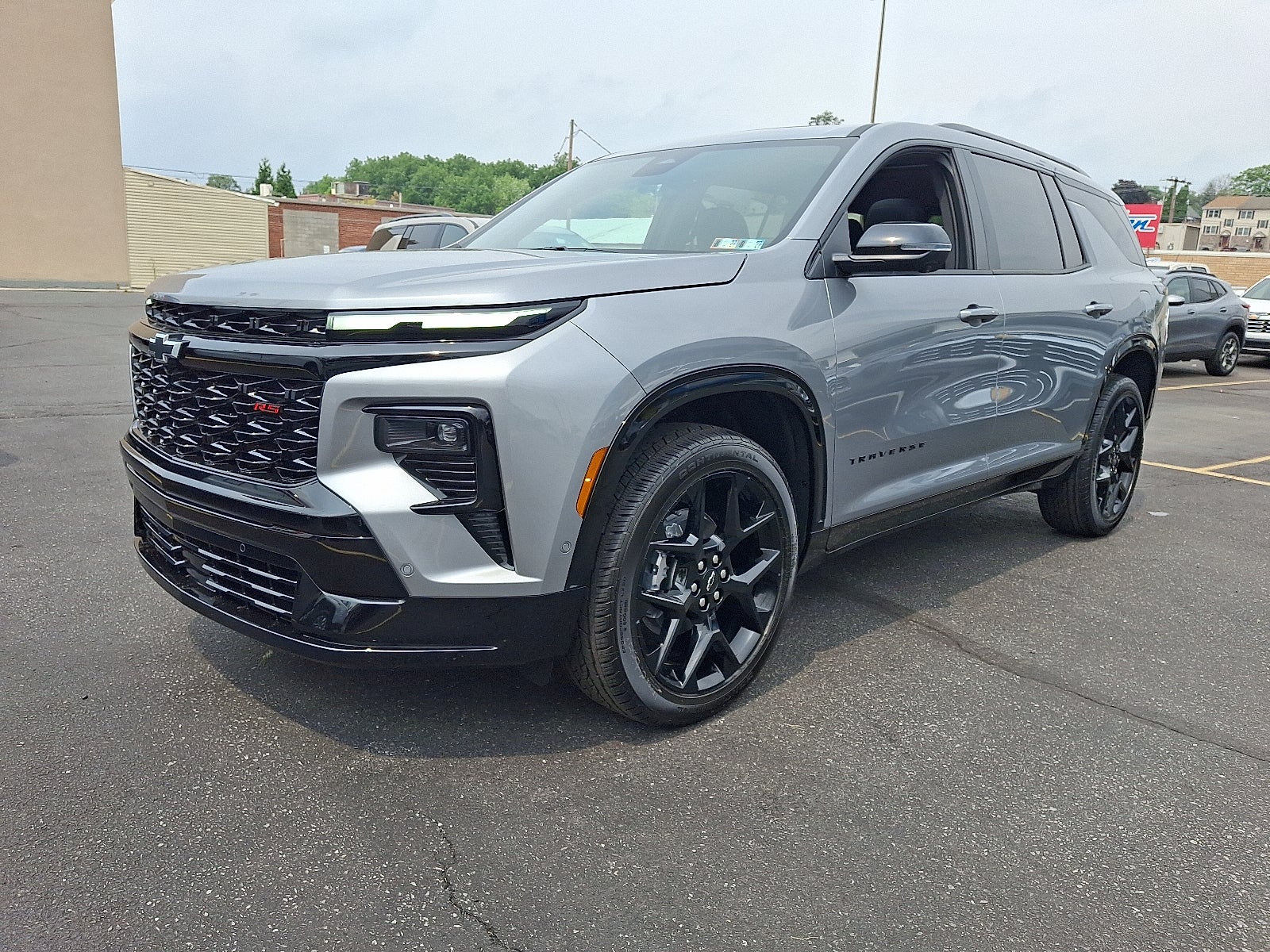 2026 Chevrolet Traverse RS AWD in Sterling Gray Metallic — front three-quarter view
