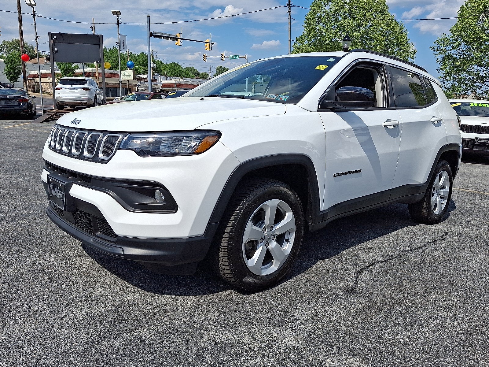 2022 Jeep Compass Latitude 4x4 4WD in Bright White Clearcoat — front three-quarter view