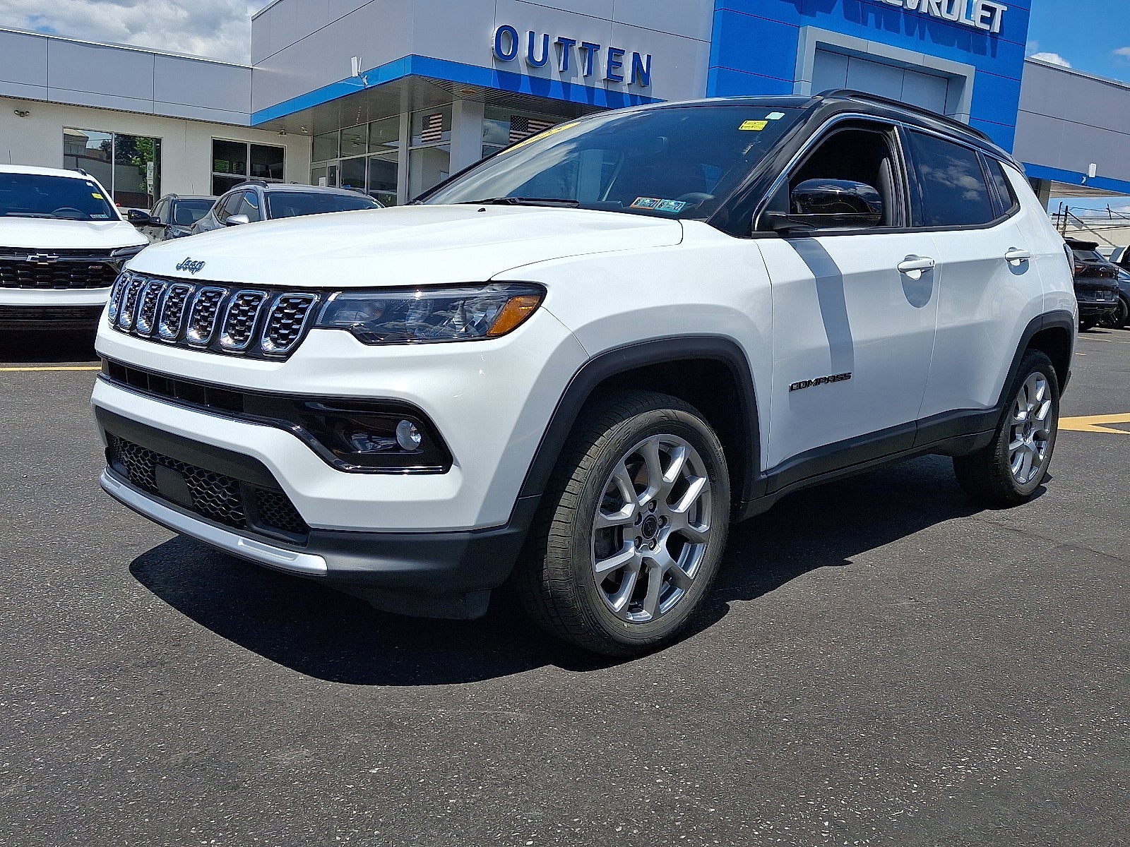 2025 Jeep Compass Limited 4x4 4WD in Bright White Clearcoat — front three-quarter view