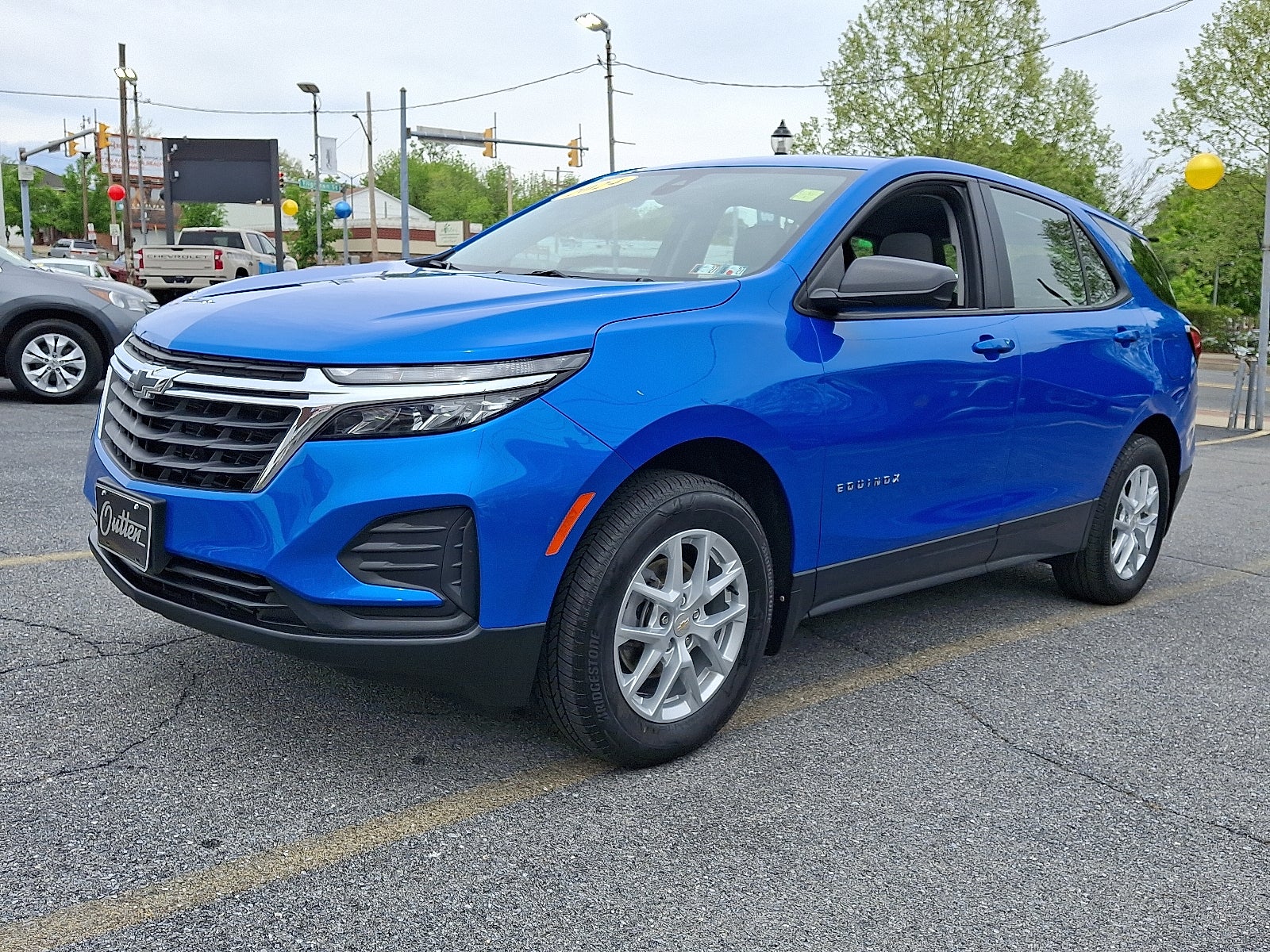 2024 Chevrolet Equinox LS AWD in Riptide Blue Metallic — front three-quarter view
