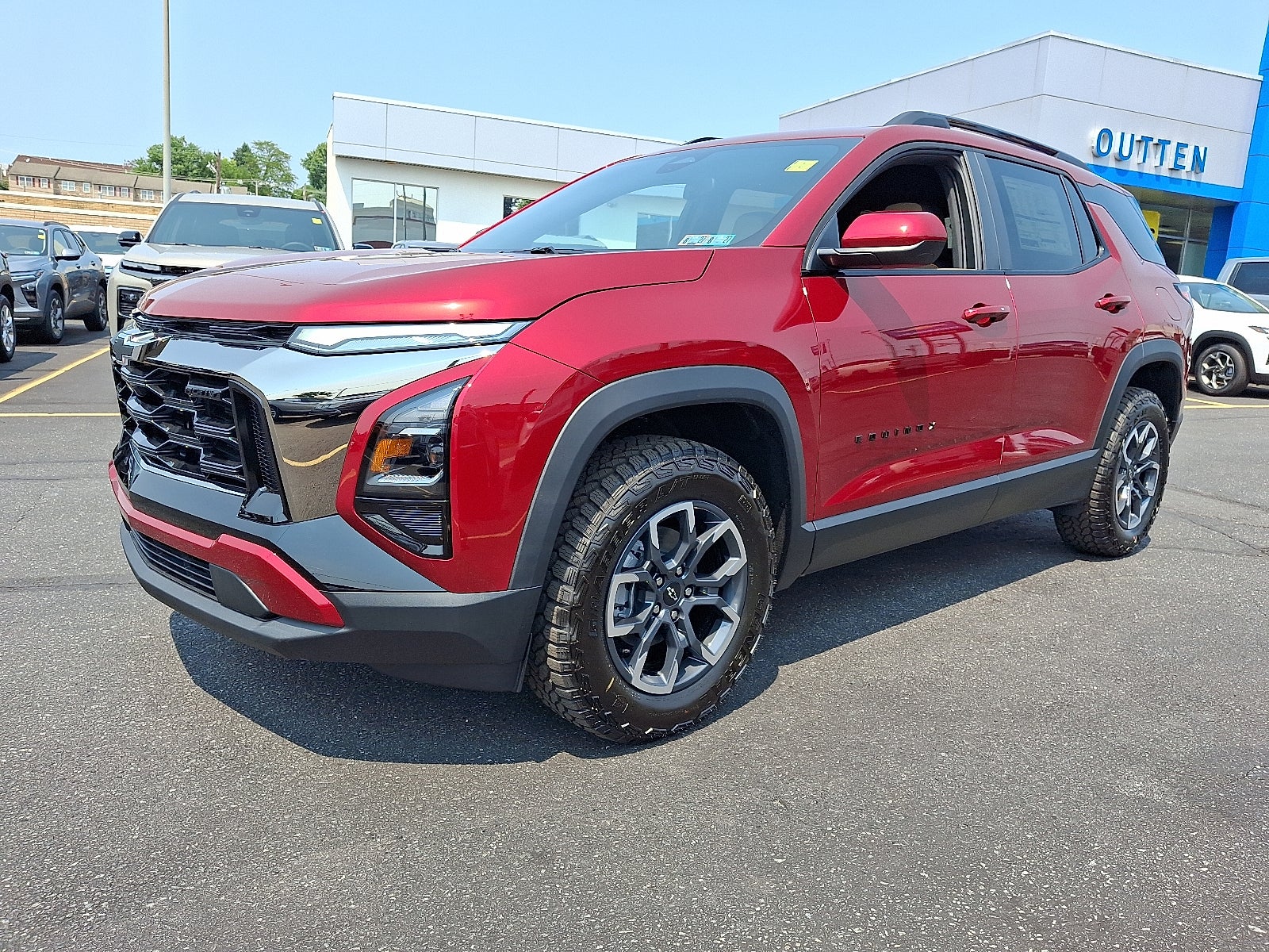 2027 Chevrolet Equinox ACTIV AWD in Radiant Red Tintcoat — front three-quarter view