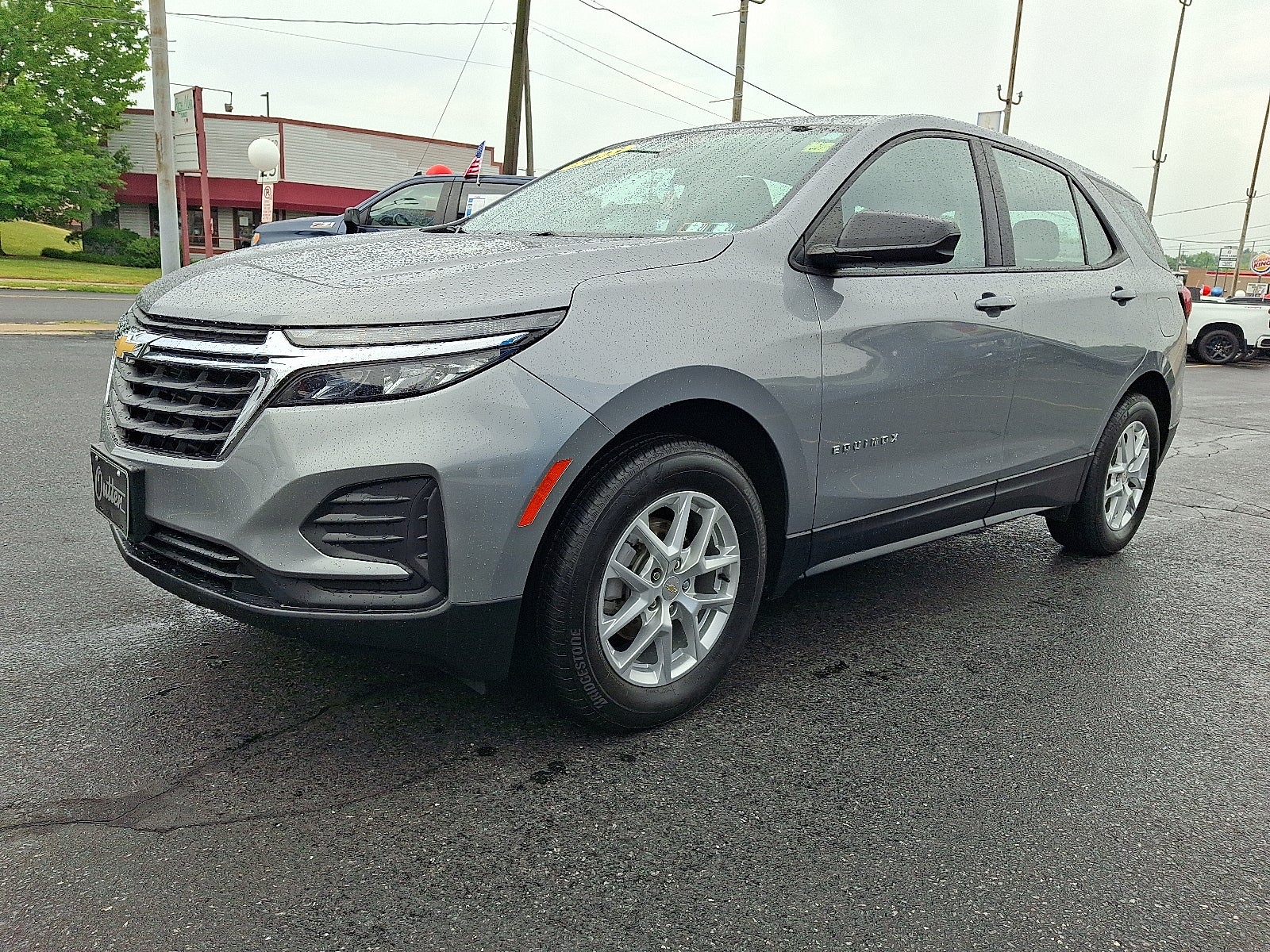 2023 Chevrolet Equinox LS AWD in Sterling Gray Metallic — front three-quarter view