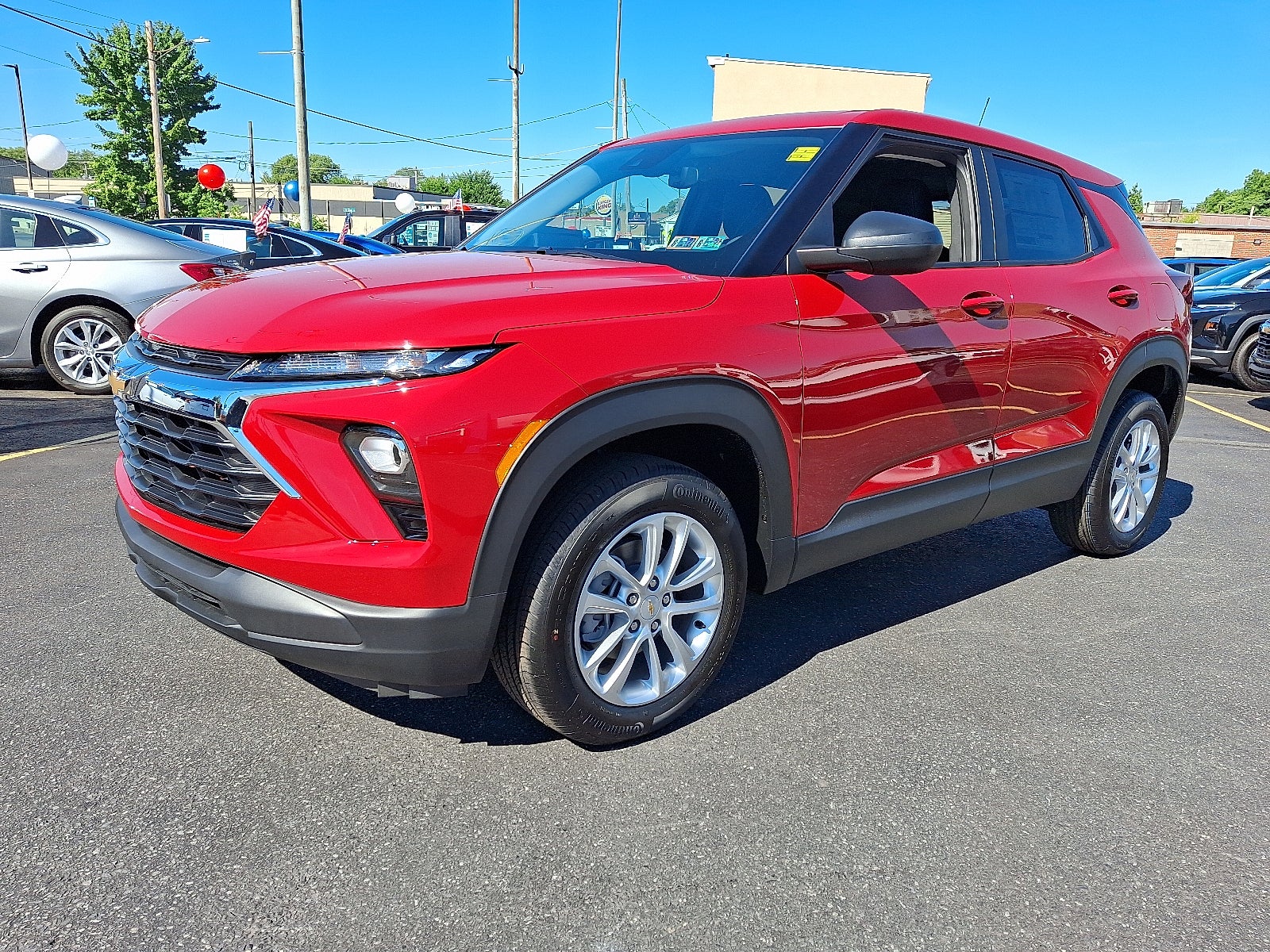 2026 Chevrolet Trailblazer LS AWD in Apex Red — front three-quarter view
