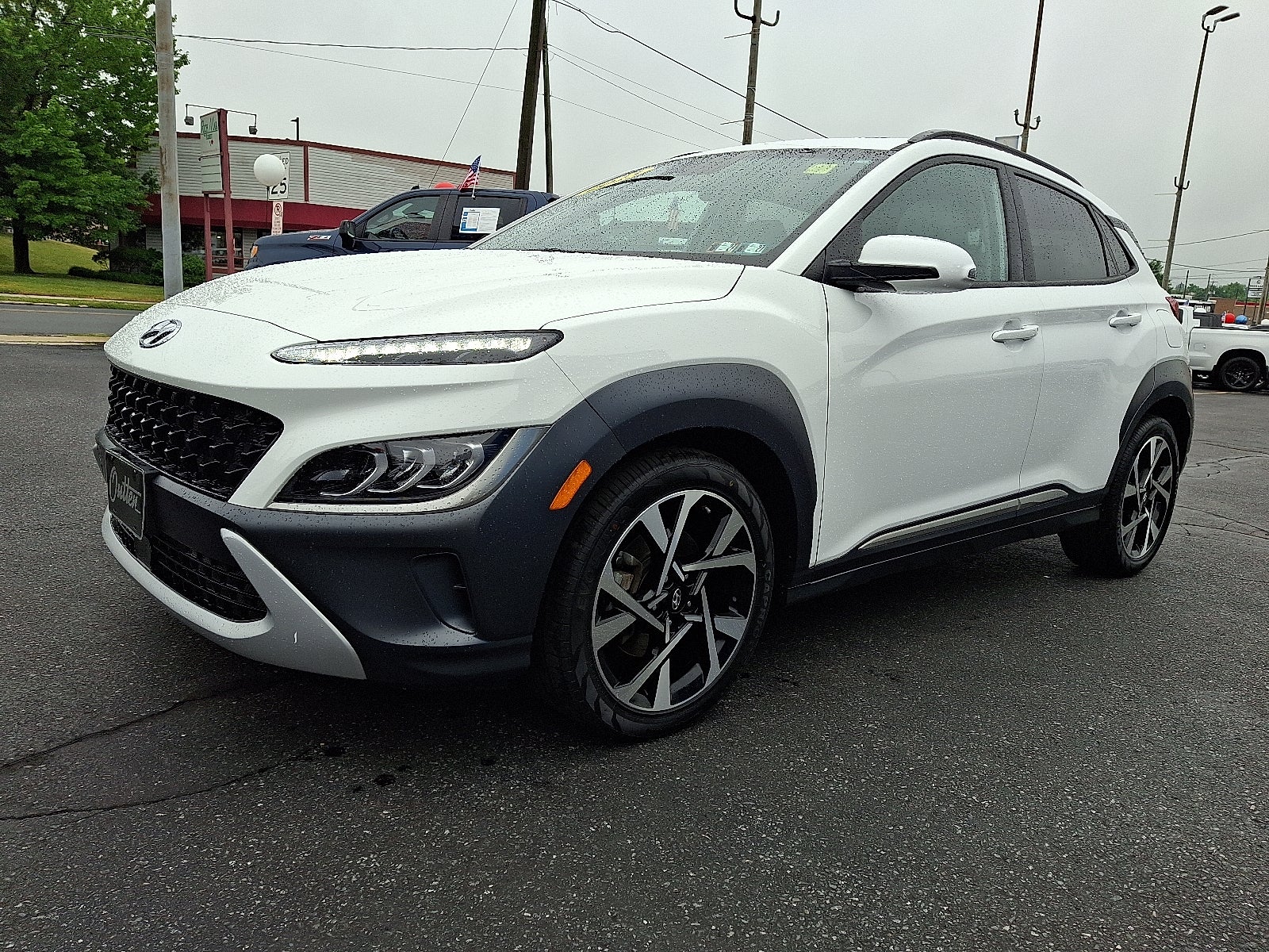 2023 Hyundai Kona Limited AWD in Lunar White — front three-quarter view