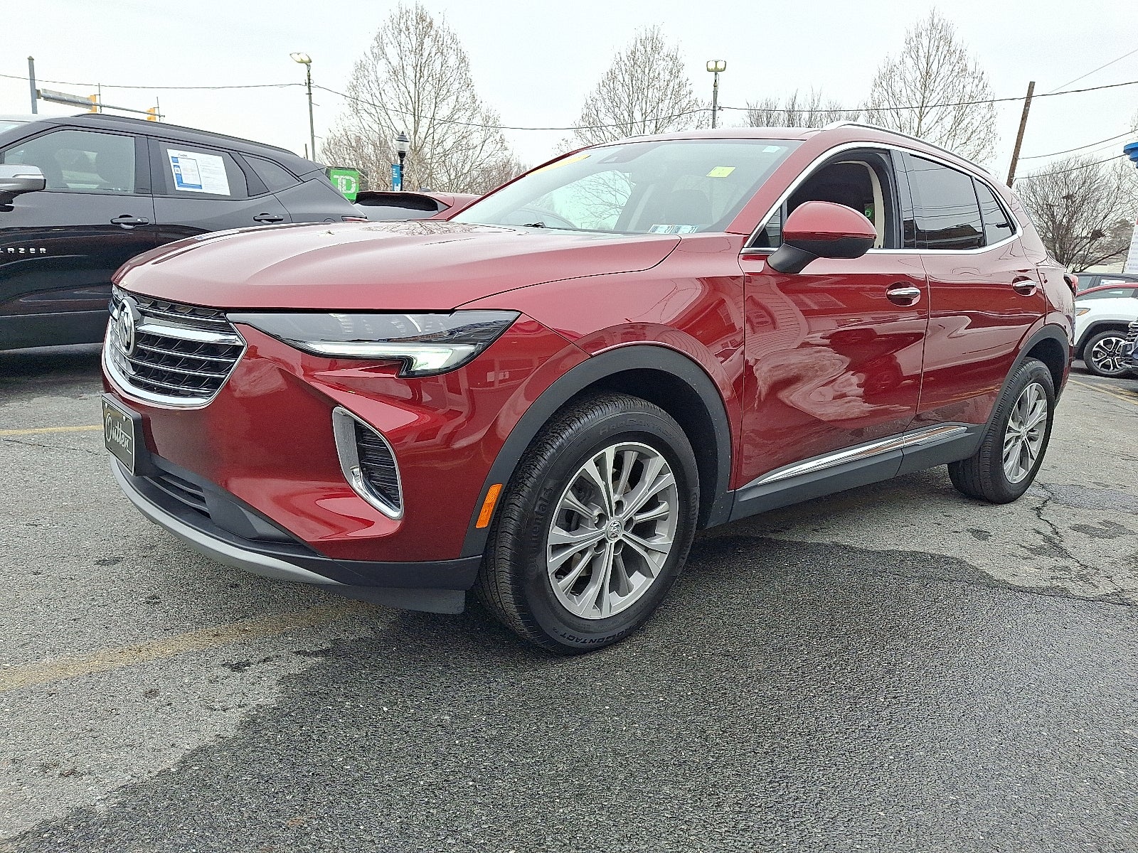 2022 Buick Envision Preferred FWD in Cinnabar Metallic — front three-quarter view