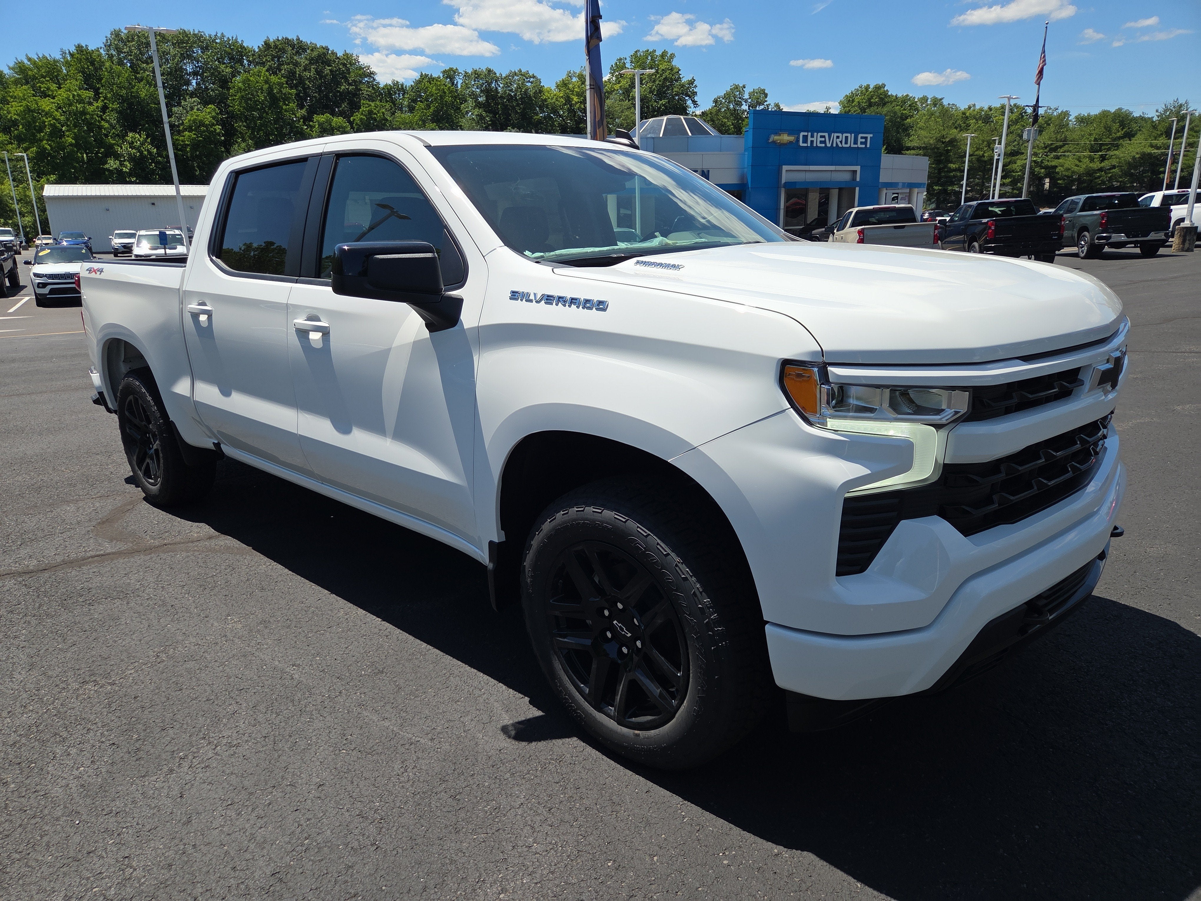 2026 Chevrolet Silverado 1500 RST 4WD in Summit White — front three-quarter view