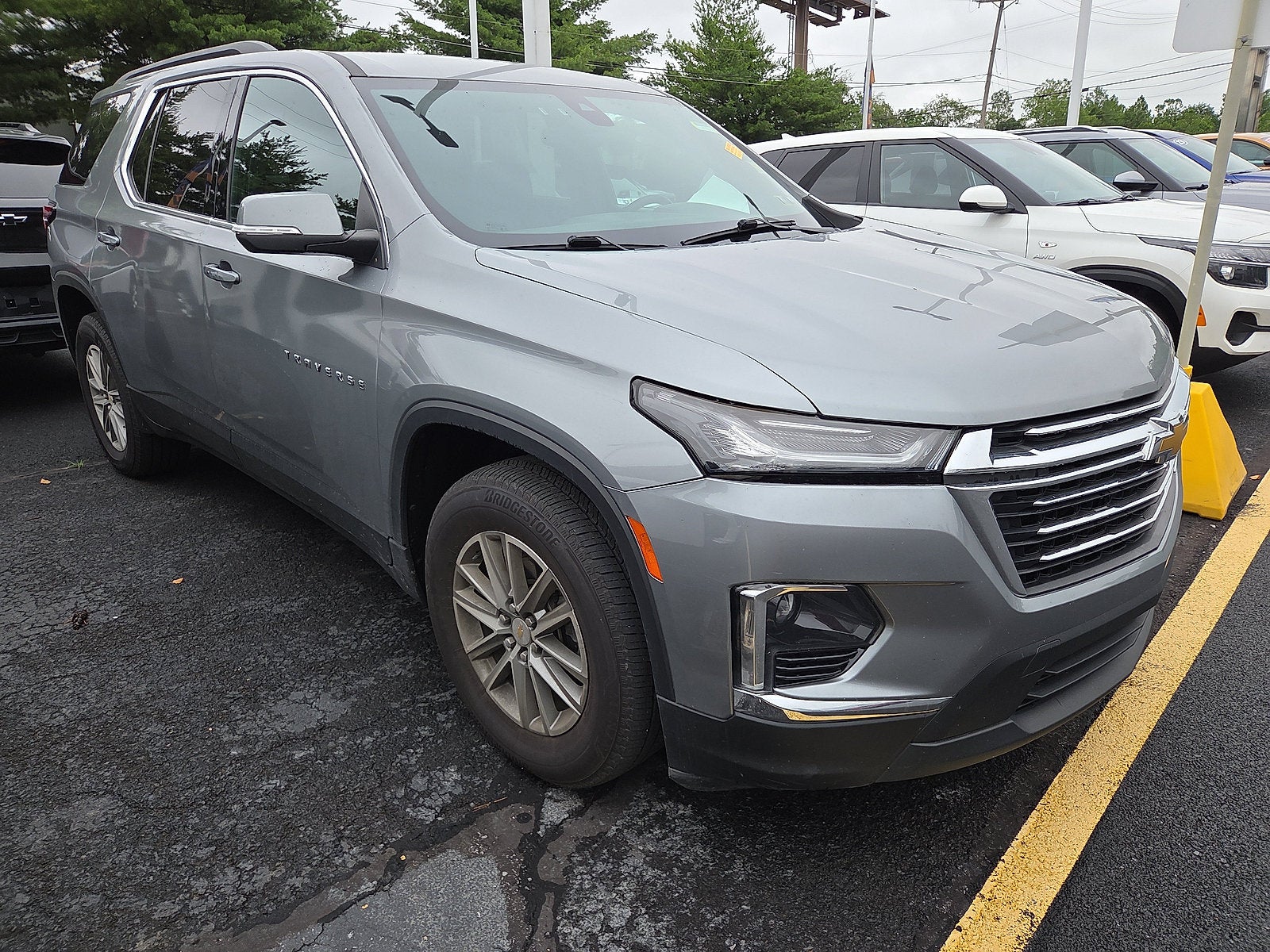 2023 Chevrolet Traverse LT Cloth AWD in Sterling Gray Metallic — front three-quarter view
