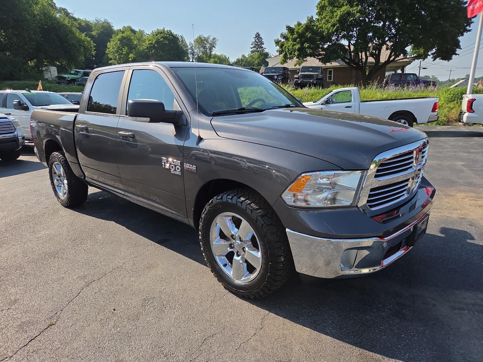2019 RAM 1500 Classic Big Horn 4x4 Crew Cab 5'7" Box in Granite Crystal Metallic Clearcoat — front three-quarter view