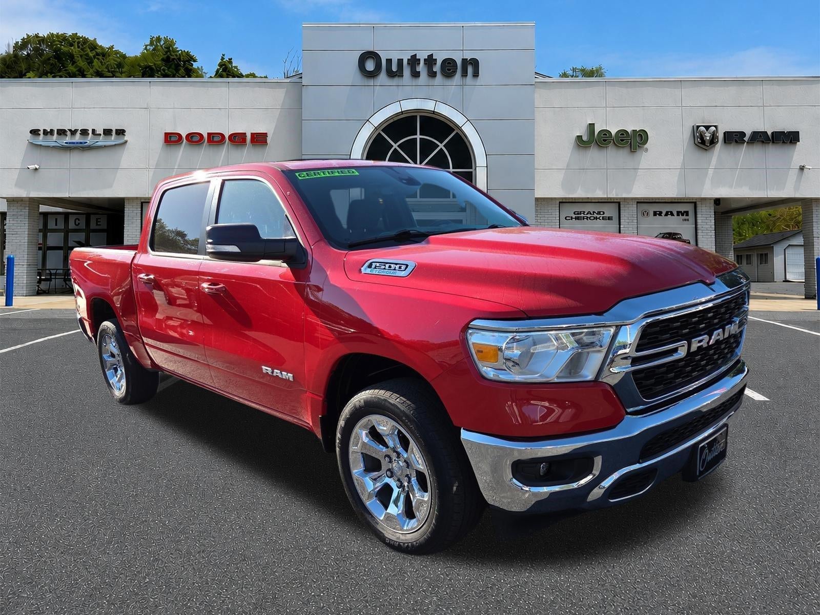2022 RAM 1500 Big Horn 4x4 Crew Cab 5'7" Box in Flame Red Clearcoat — front three-quarter view
