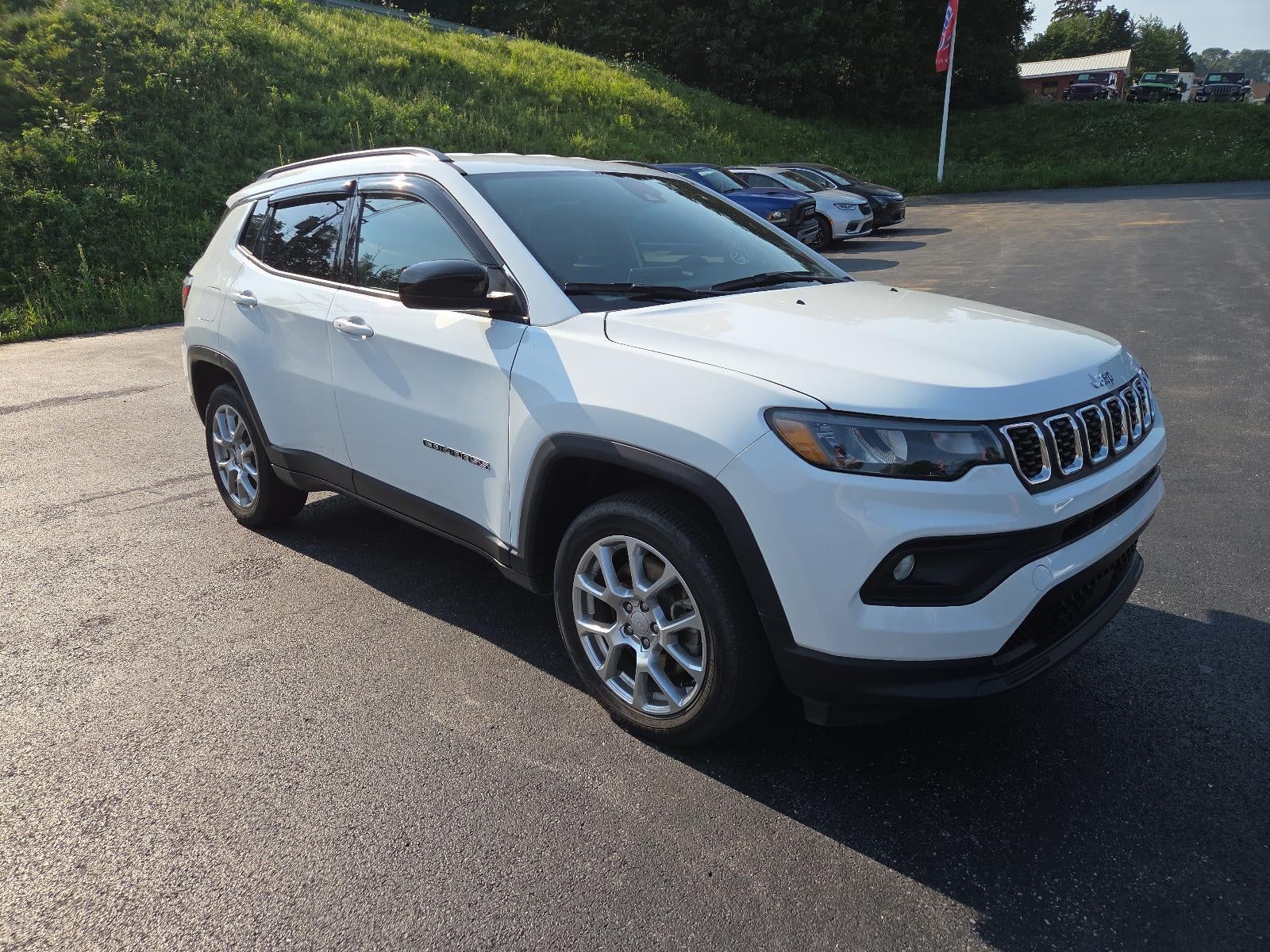 2024 Jeep Compass Latitude Lux 4x4 in Bright White Clearcoat — front three-quarter view