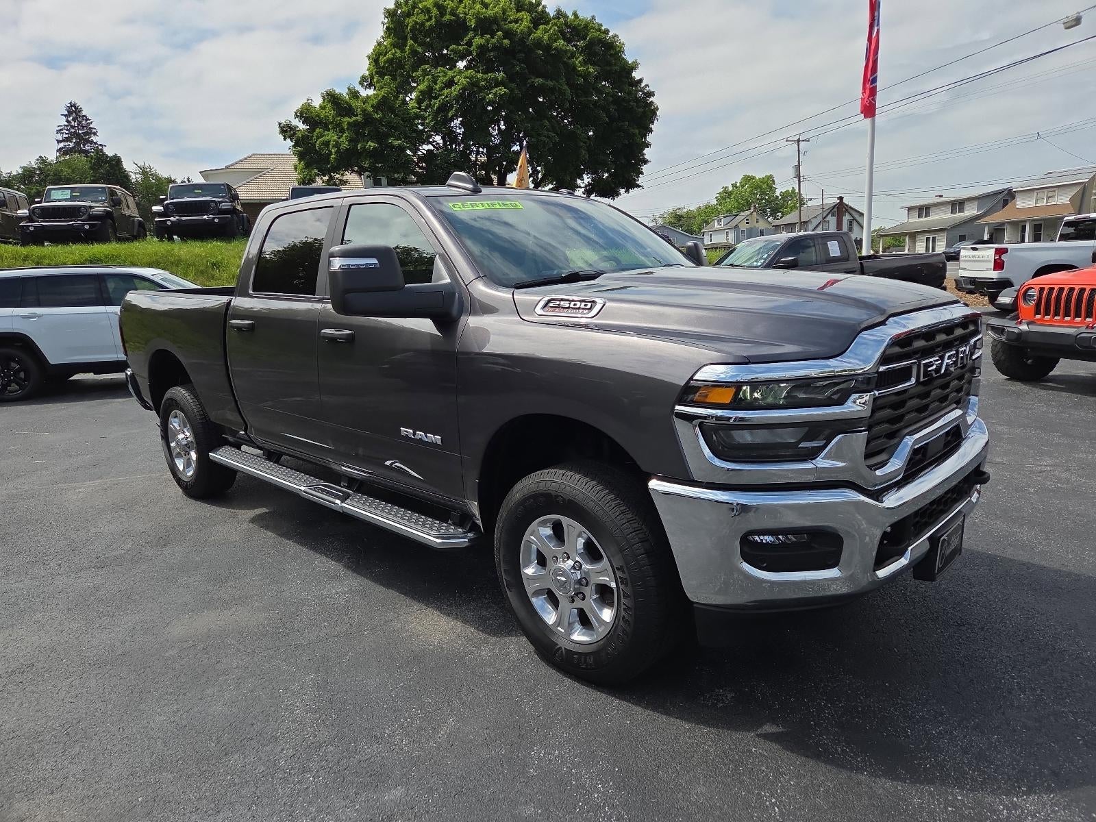 2025 RAM 2500 Big Horn 4x4 Crew Cab 6'4" Box in Granite Crystal Metallic Clearcoat — front three-quarter view