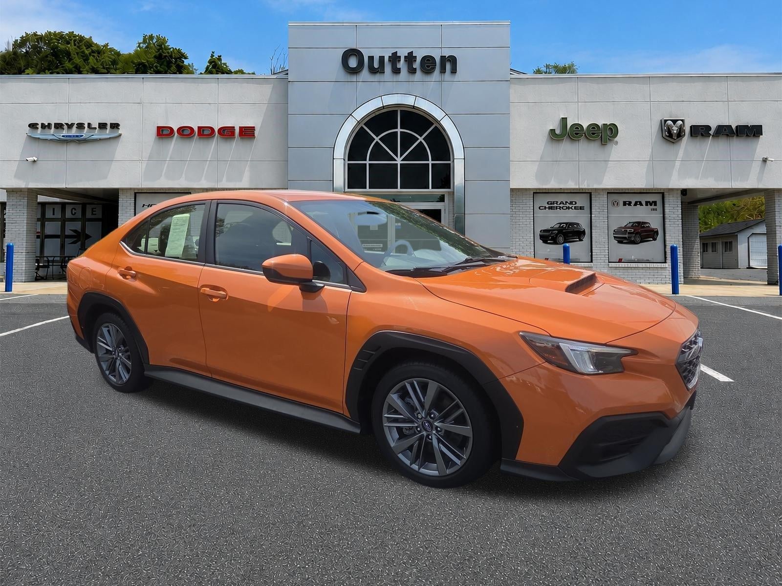 2022 Subaru WRX Manual in Solar Orange Pearl — front three-quarter view