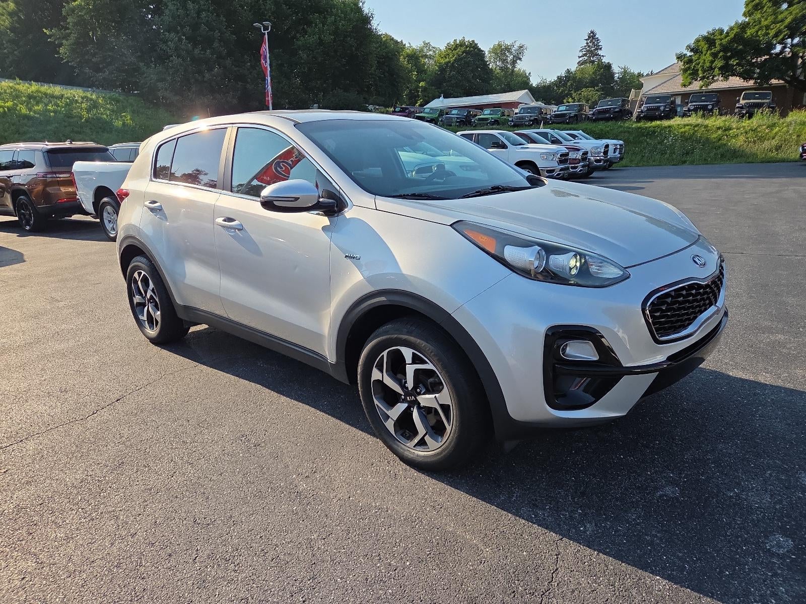 2020 Kia Sportage LX AWD in Sparkling Silver — front three-quarter view