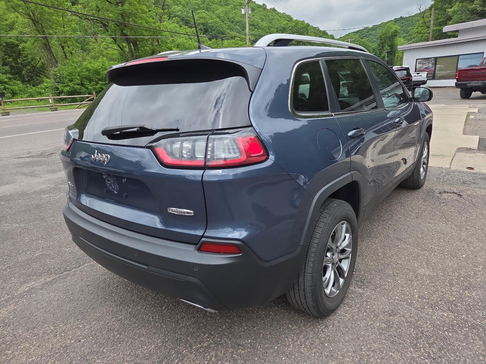 2021 Jeep Cherokee — rear three-quarter view