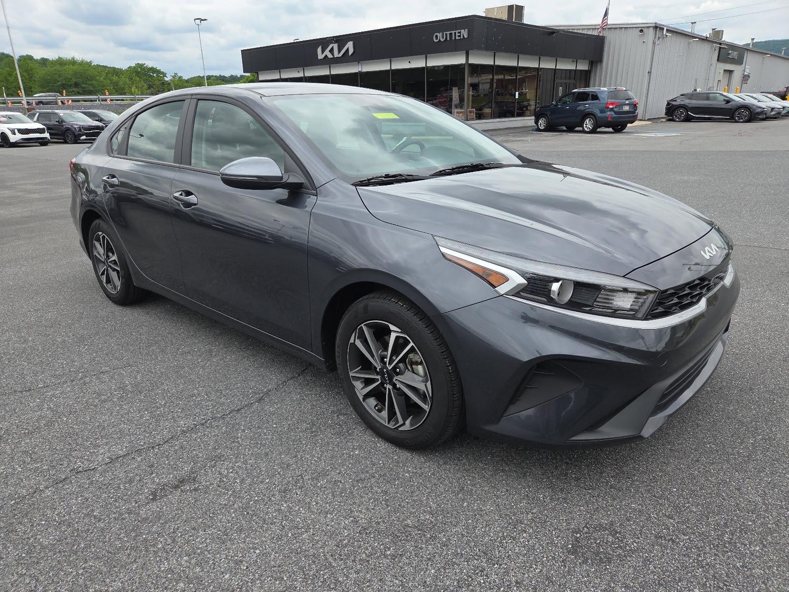 2023 Kia Forte LXS IVT in Gravity Gray — front three-quarter view